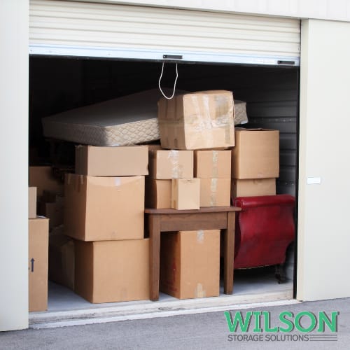 Image of boxes stacked in a storage unit